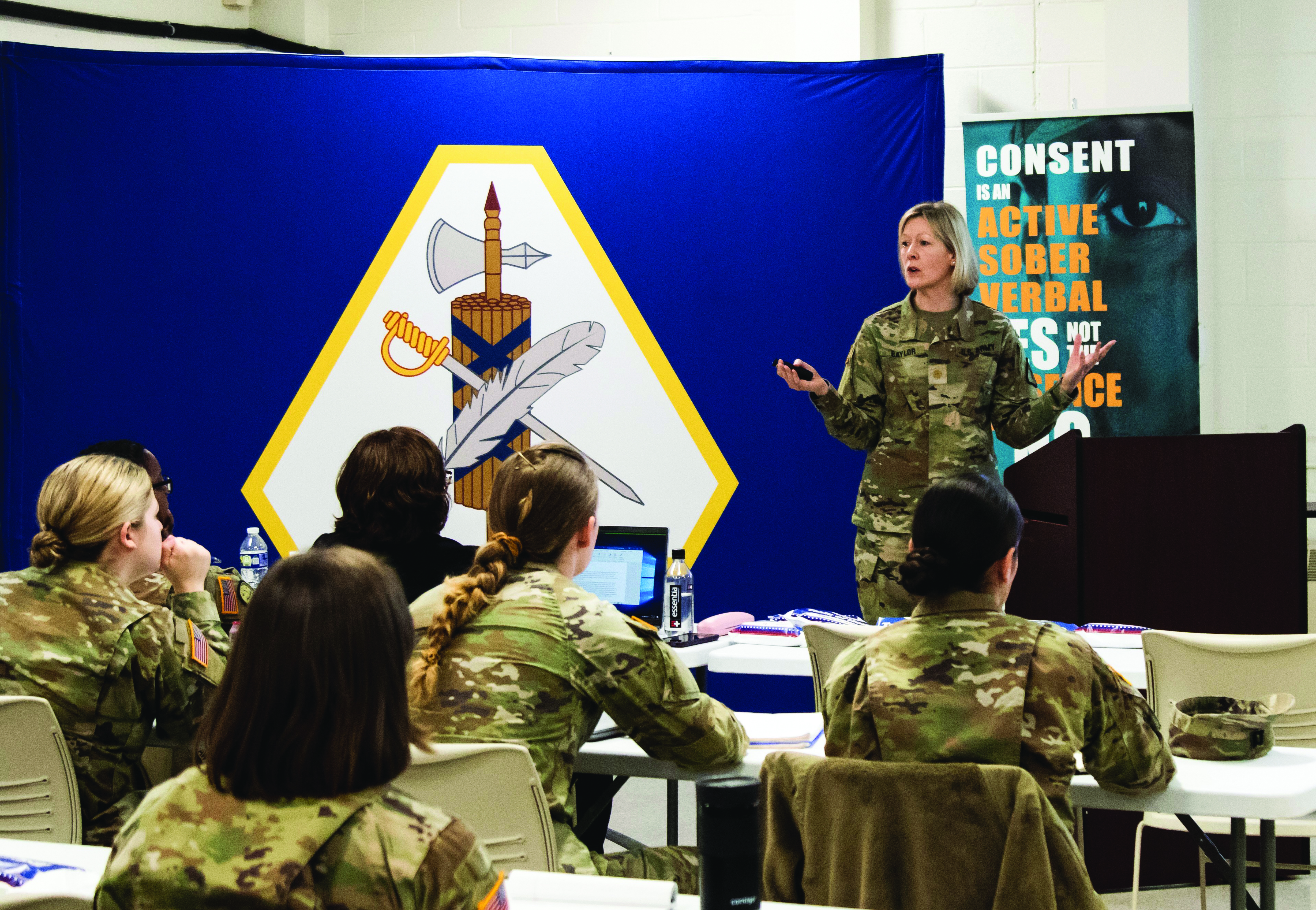 MAJ Amanda B. Baylor, USAR SVC Deputy Program Manager, briefs attendees at the active/Reserve component integrated SVC Regional Training held 5-7 December 2023 at the USARLC in Gaithersburg, MD. In this photo, MAJ Baylor specifically addresses active component SVCs and paralegals about the uniqueness of the USAR (especially part-time support) within the context of the SVC Program. (Credit: 1LT Amber Lamb, USARLC)